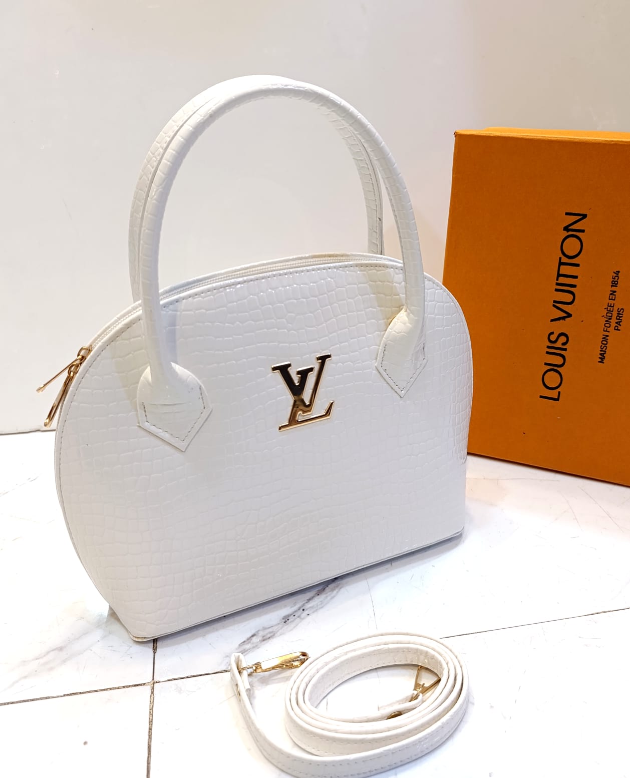 Louis Vuitton round shape bag with long strap