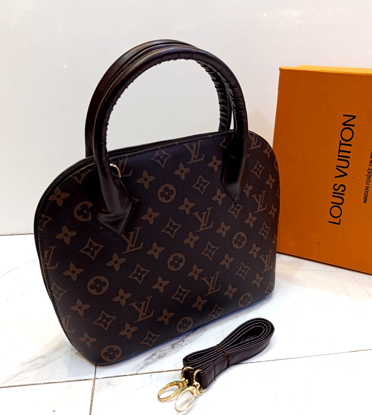 Louis Vuitton round shape bag with long strap