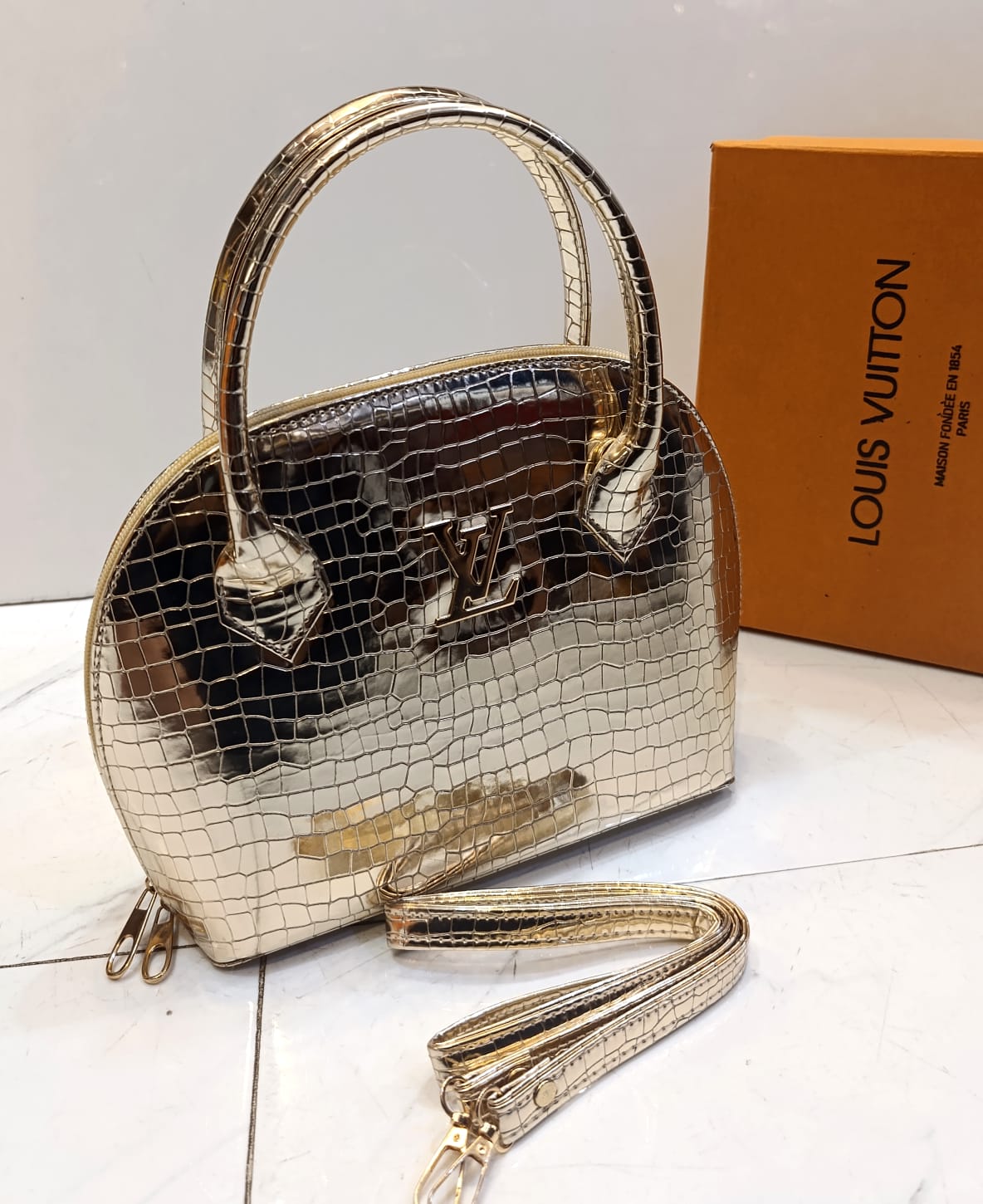 Louis Vuitton round shape bag with long strap